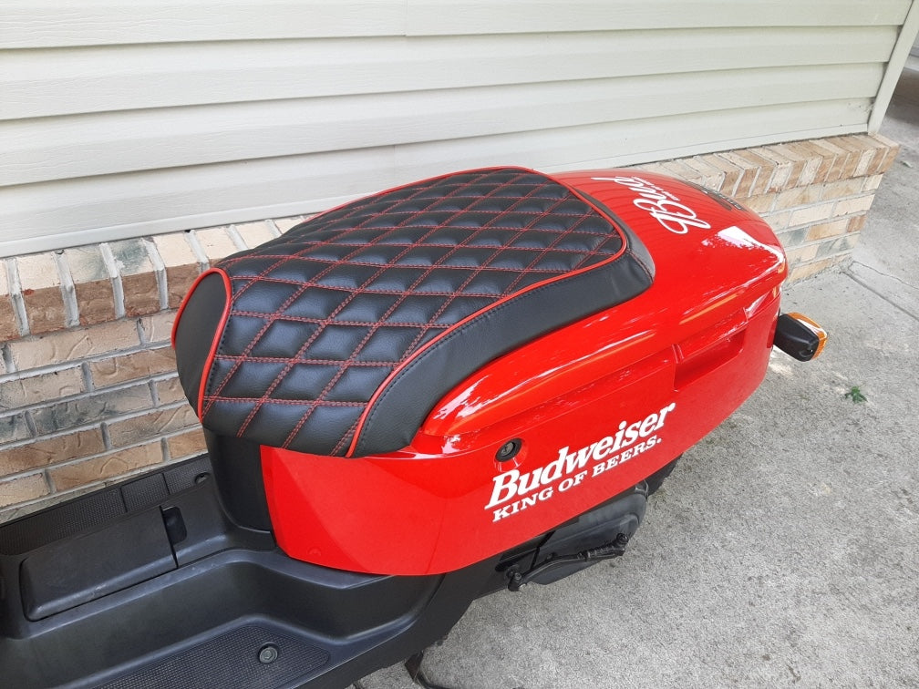 Black and red diamond seat cover fitted to a customized red Yamaha C3, showing the tailored coverage, handmade by Cheeky Seats.