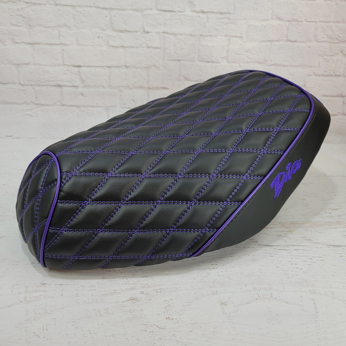 Honda Dio 1 & 2 Diamond Seat Cover with purple stitching, Piping, and embroidered Dio logos, handmade by Cheeky Seats