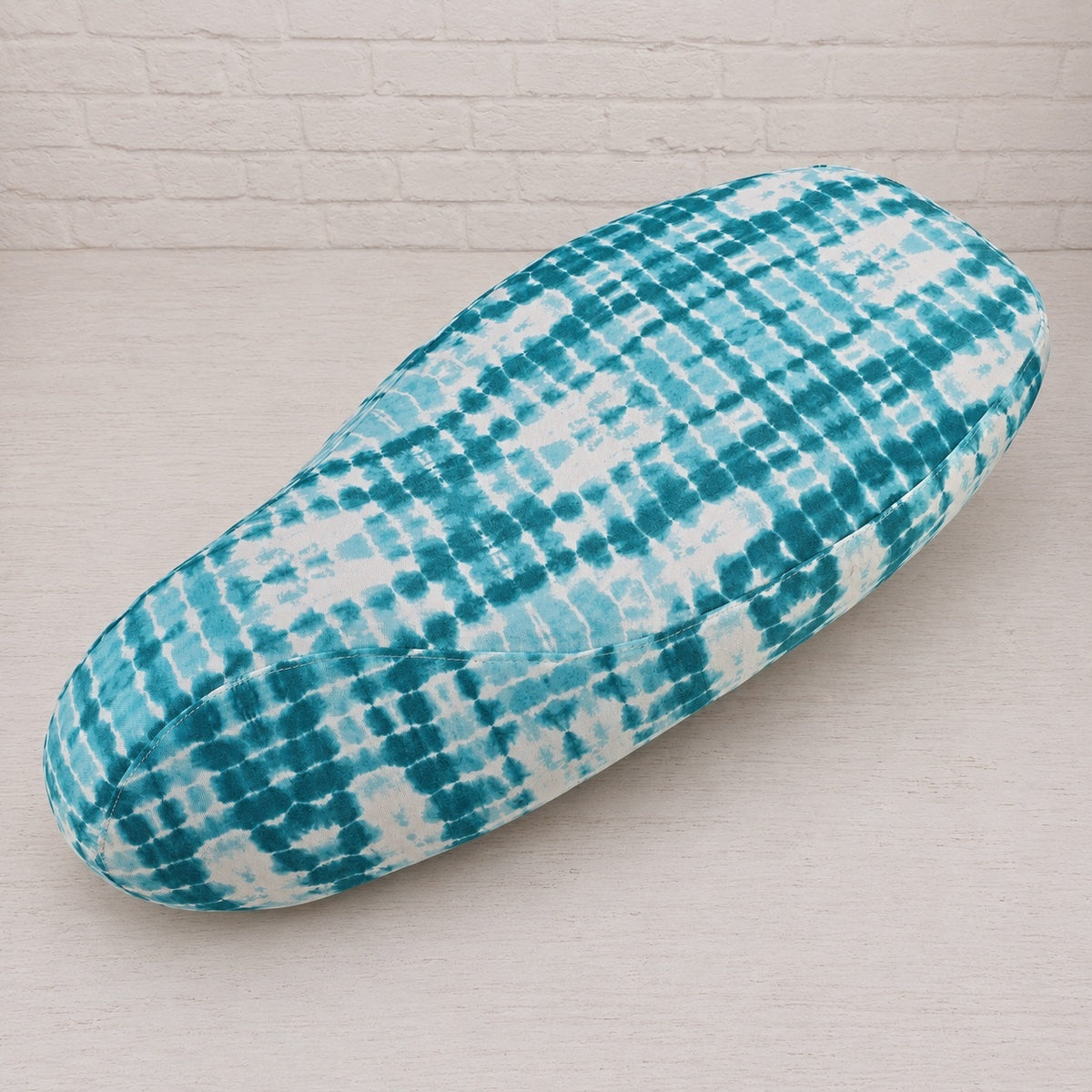 Sea Glass breathable scooter seat cover with an airy aqua and white tie-dye pattern for a cooler-looking ride, handmade by Cheeky Seats.