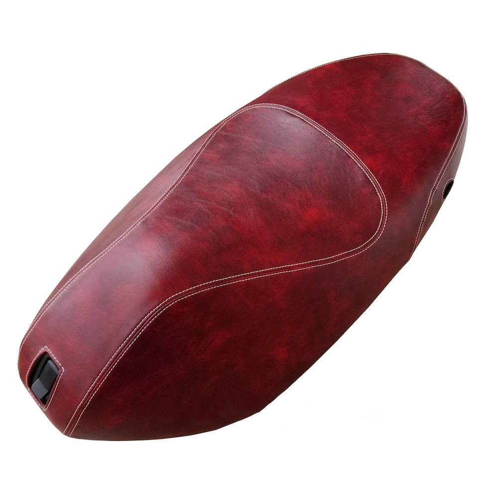 Oxblood marbled Piaggio Fly 50–150 seat cover with contrasting cream French seams and front lock opening, handmade by Cheeky Seats