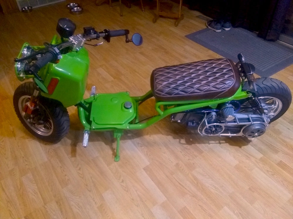 Customer photo of a lime green Maddog scooter with a Cheeky Seats tobacco brown diamond seat cover installed