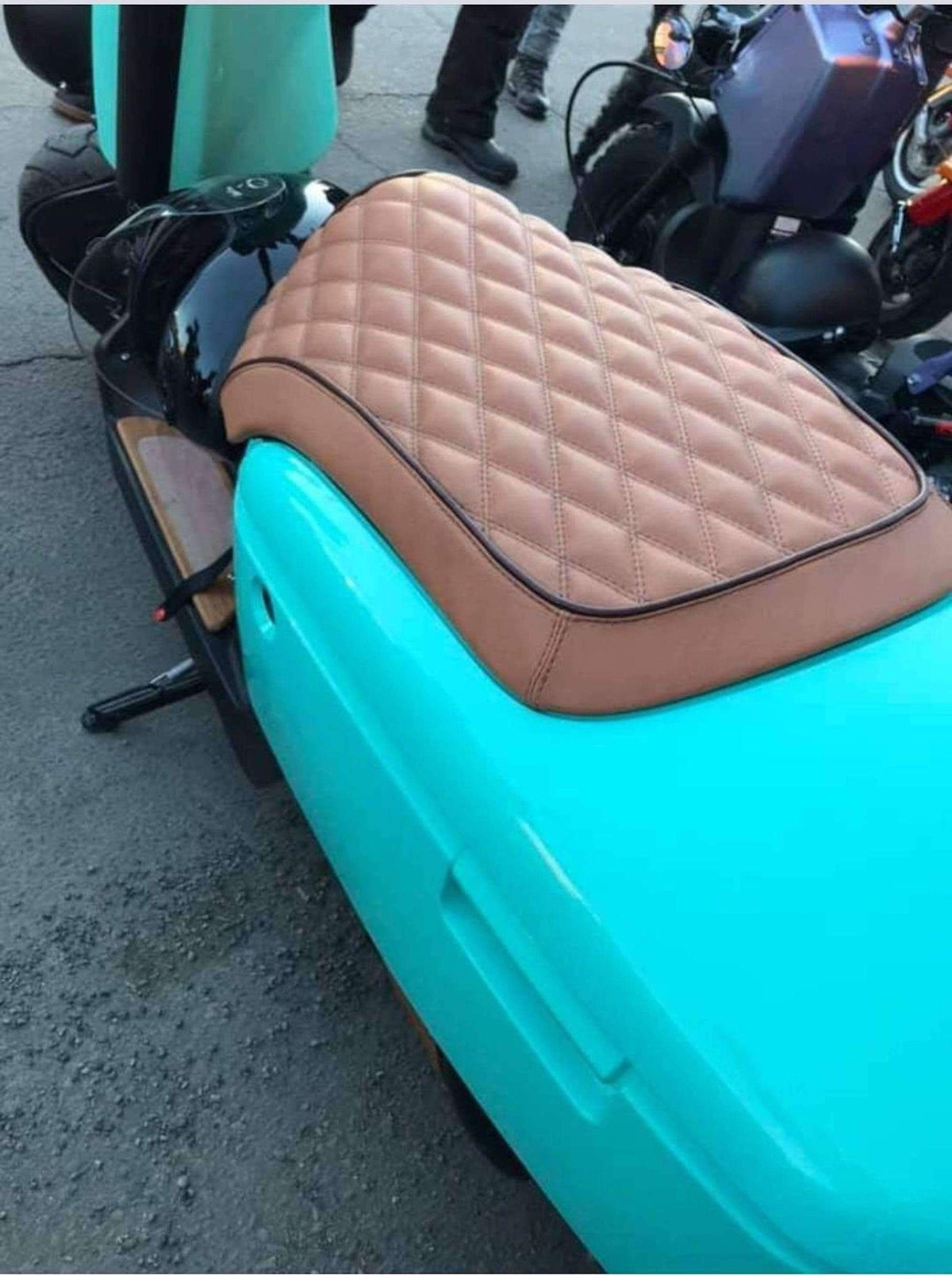 Tan diamond seat cover fitted to a turquoise Yamaha C3, showing the tailored shape and contrasting dark piping, handmade by Cheeky Seats.