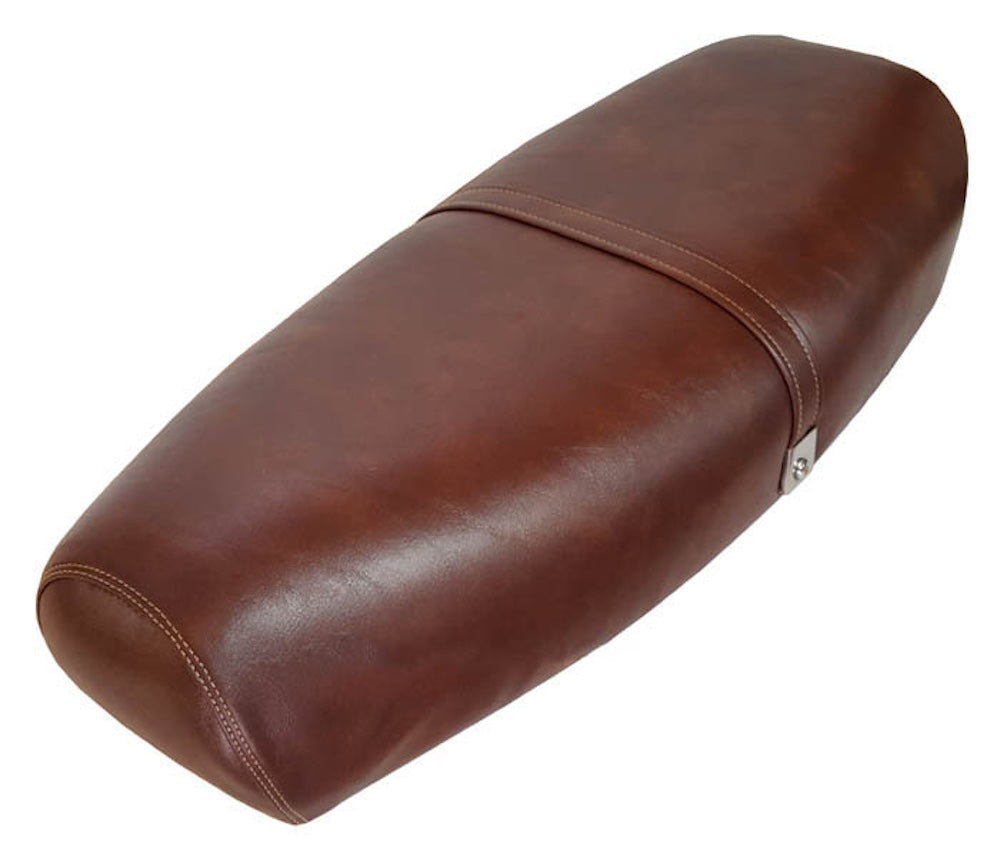 Front angle of a whiskey-brown Genuine Stella seat cover with matching strap, handmade by Cheeky Seats