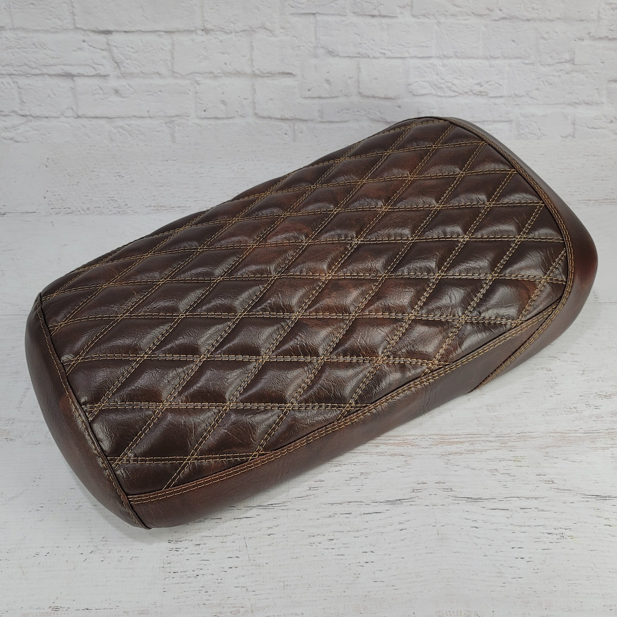 Tobacco brown distressed diamond-stitched Maddog seat cover with tan contrast stitching, handmade by Cheeky Seats
