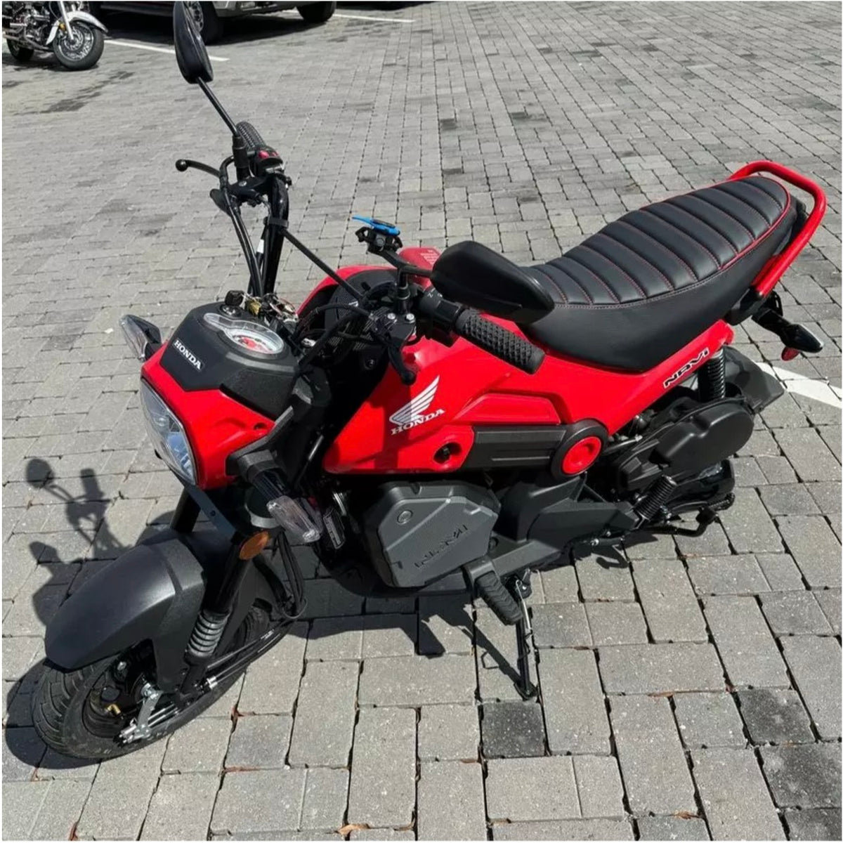 Honda Navi red tuck-and-roll seat cover with piping