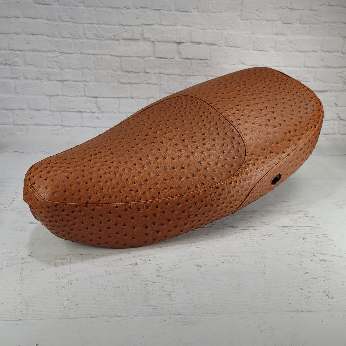 Vespa LX ostrich brown seat cover texture detail