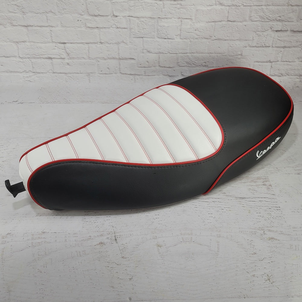 Vespa ET 2/4 two-tone padded seat cover side view, handmade by Cheeky Seats