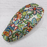 Folk Scandi Vespa seat cover for ET, LX, Sprint and Primavera, with a bold folk-art botanical pattern, handmade by Cheeky Seats.