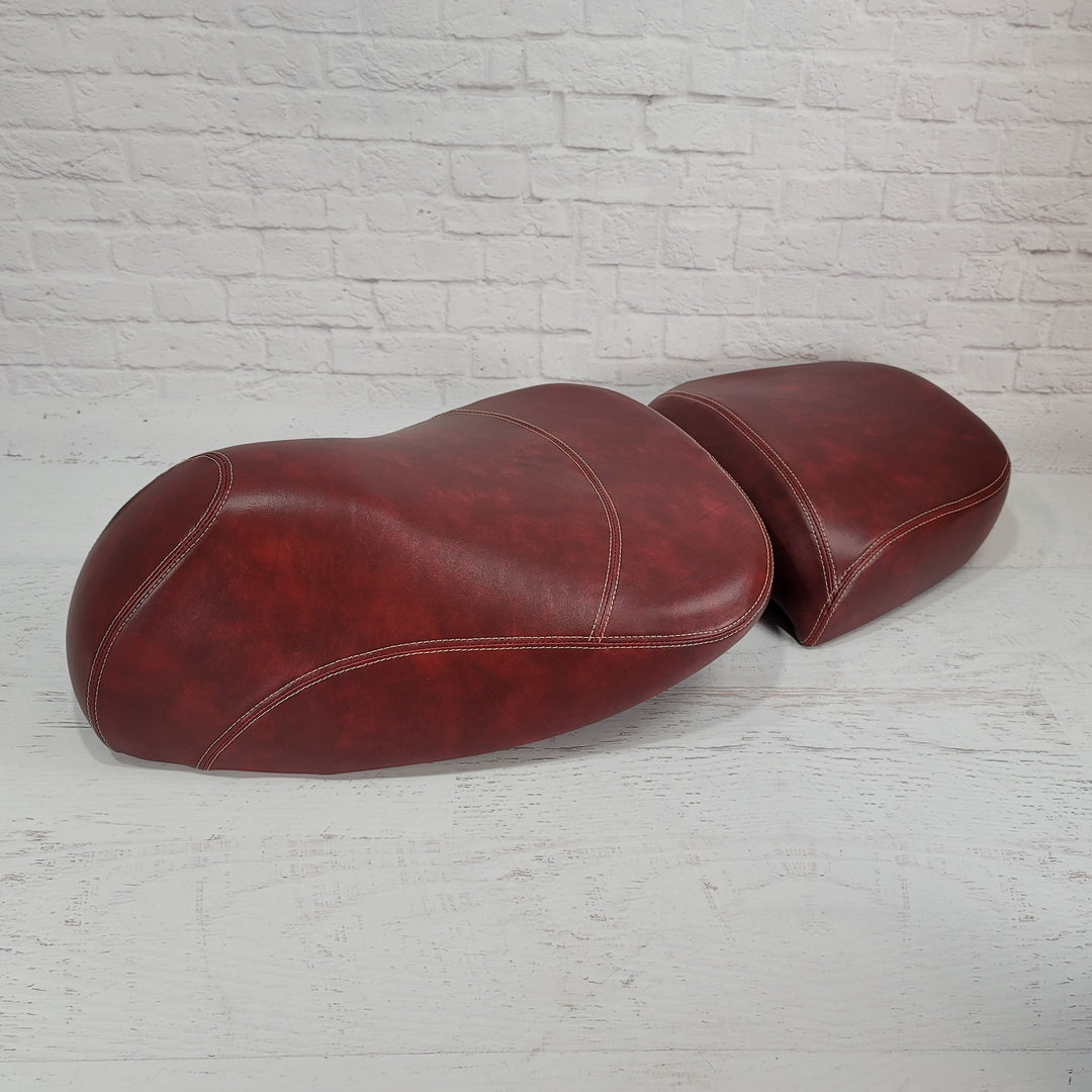 Vespa GTV split saddle seat cover in distressed burgundy oxblood with french seams