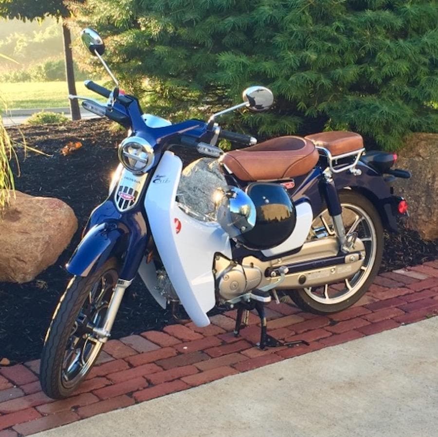 Honda Super Cub caramel seat cover installed